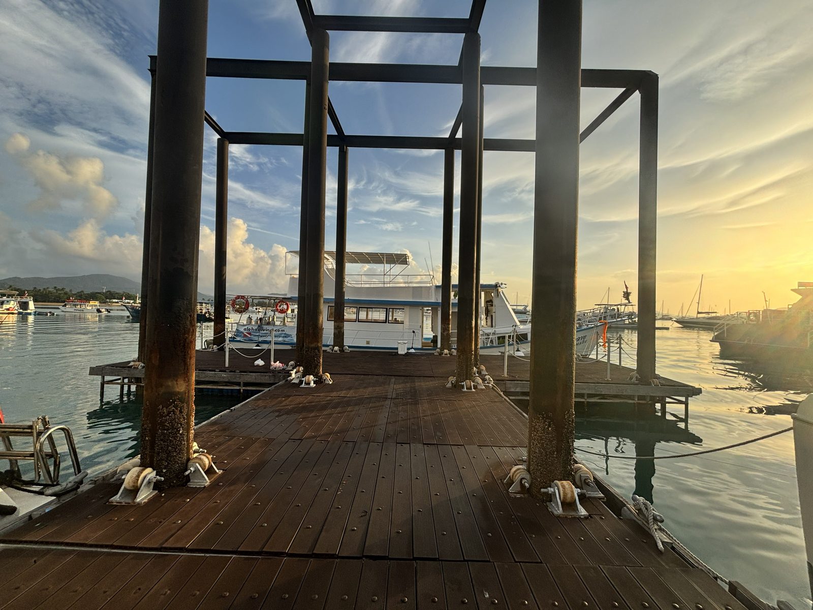 Sunrise over the wooden pier, MV Matchanu moored at its end