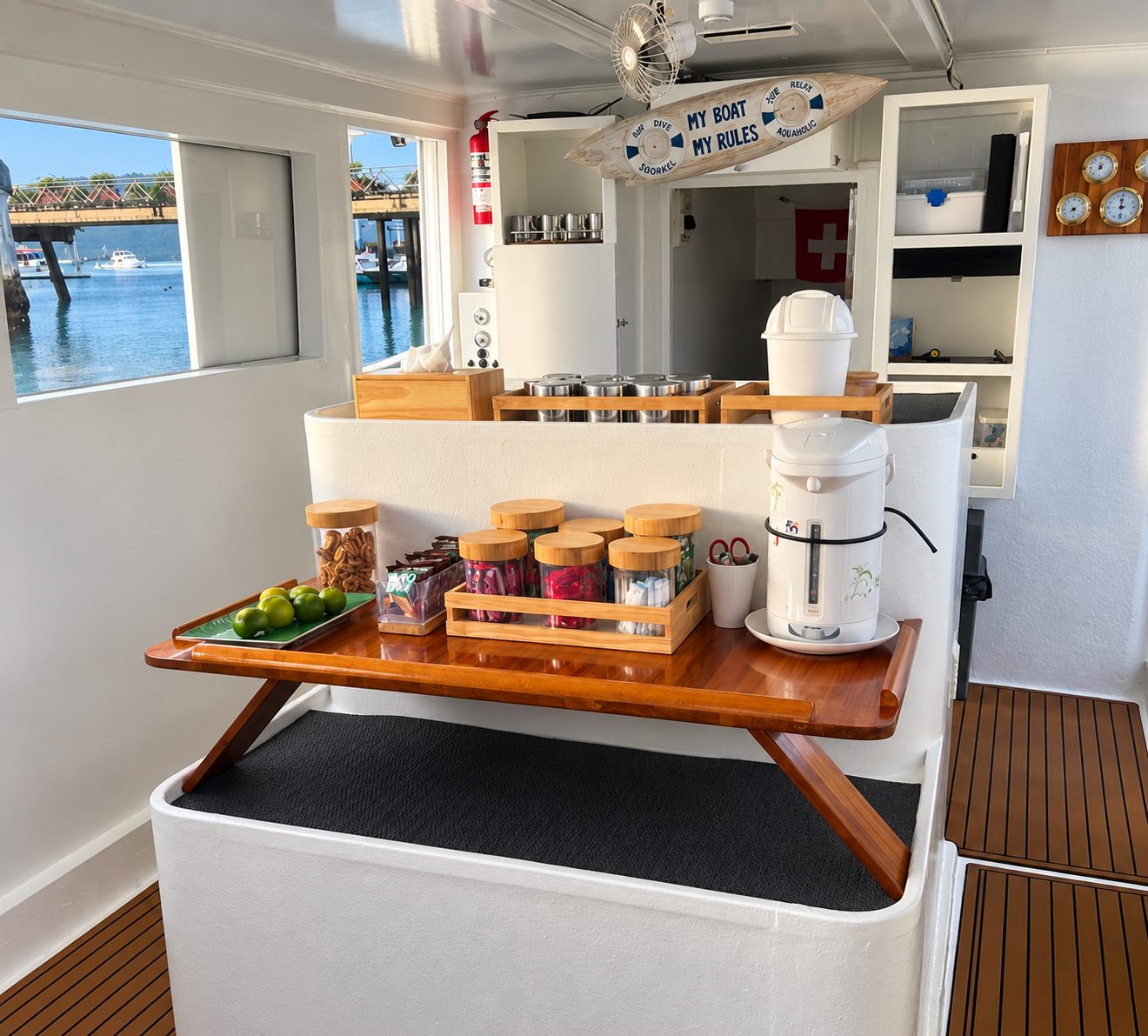The saloon’s snack bar: jars of snacks, fresh fruit and a hot-water urn