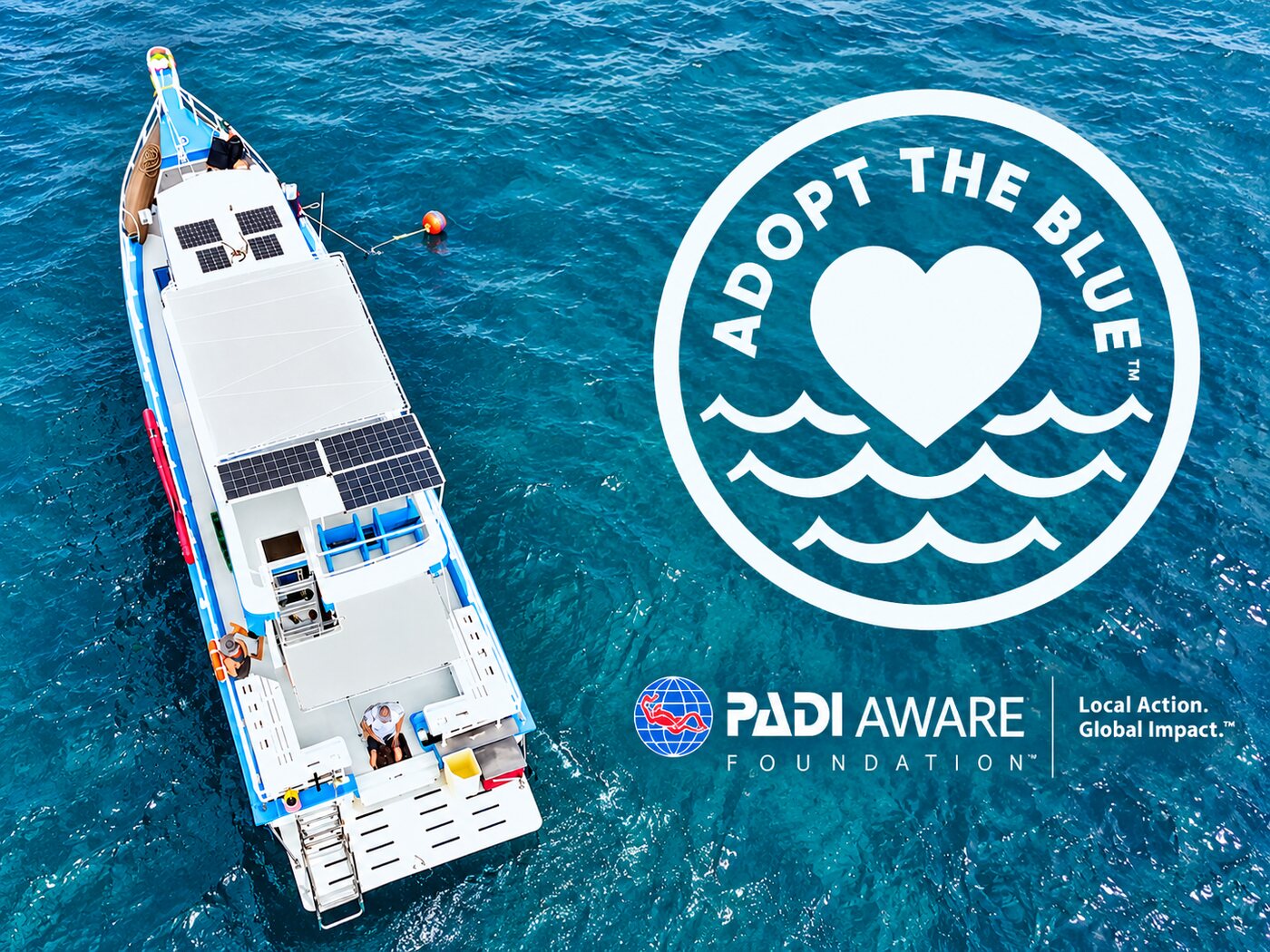 MV Matchanu from above at Koh Mai Thon with the Adopt the Blue heart and the PADI AWARE Foundation mark