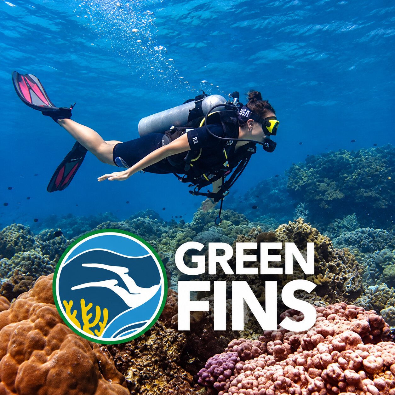 A diver in good trim over a coral reef, the Green Fins mark in the corner