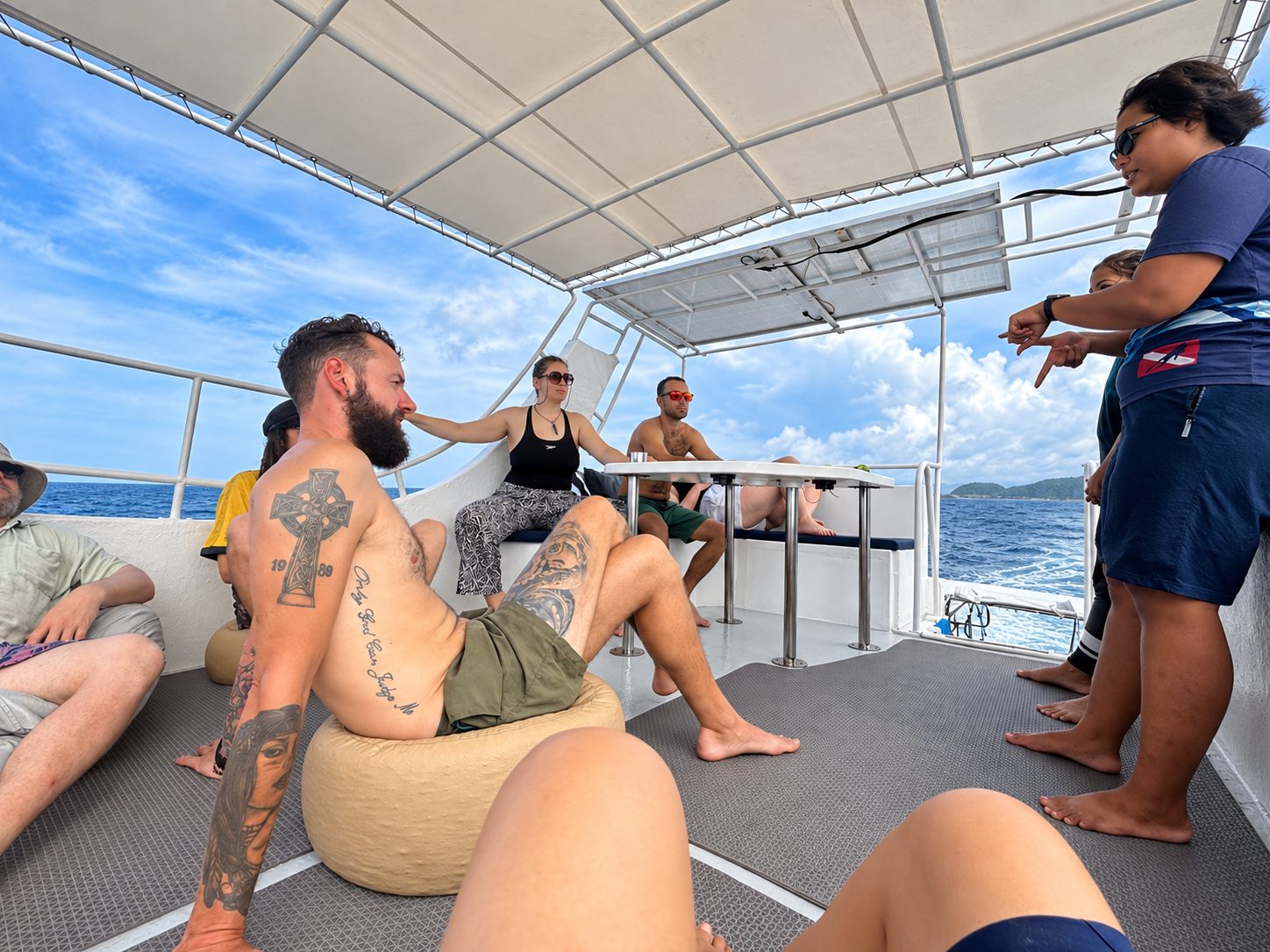 A dive briefing on the sun deck before the first dive
